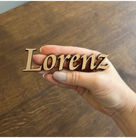 Skrift Lorenz sammanhngande valfri text gjuten i brons